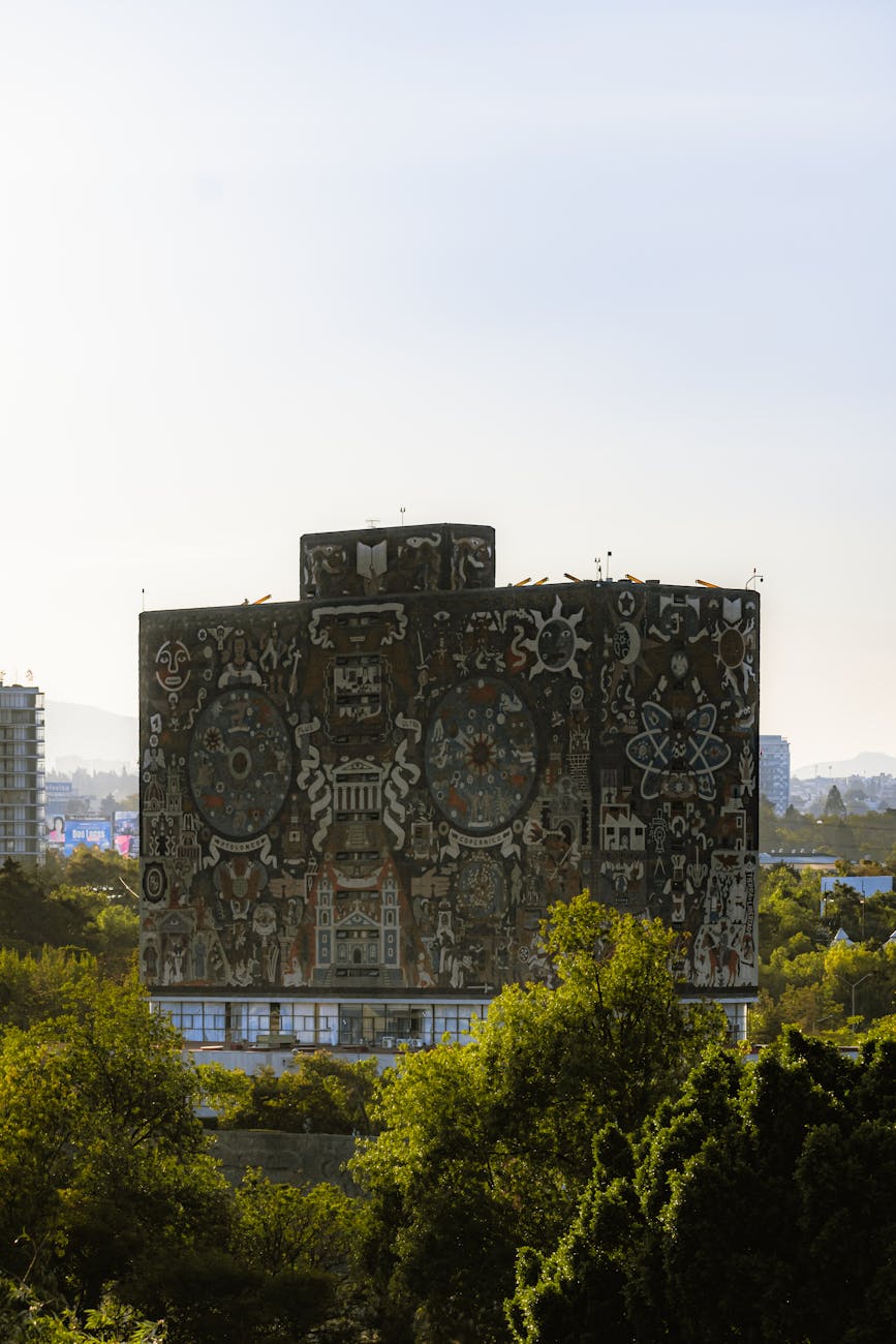 aztec painting on unam building in mexico city